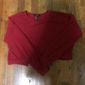 cropped red long sleeve slit back top